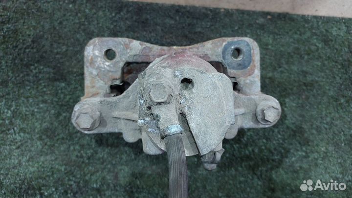 Суппорт тормозной задний левый LH2 4.6 STS 1