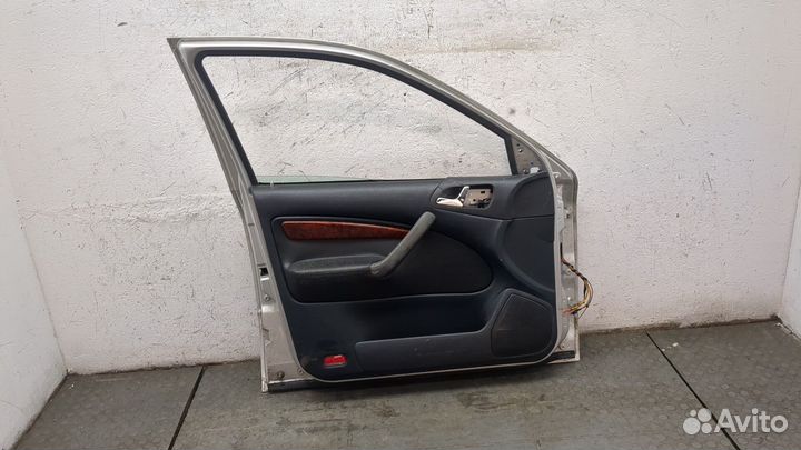 Дверь левая передняя Skoda Octavia Tour