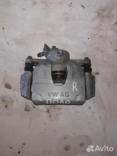 Суппорт передний Volkswagen Polo 5