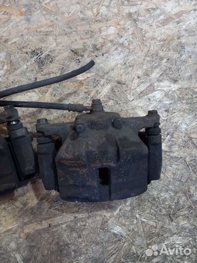 Суппорт Передний Левый Правый Ниссан Кашкай J10