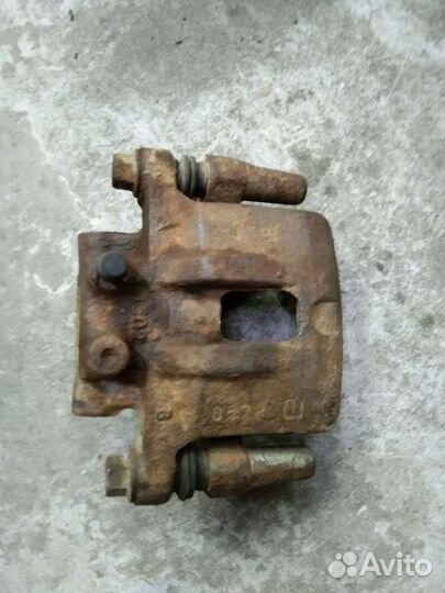 Суппорт задний Митсубиси Лансер 10