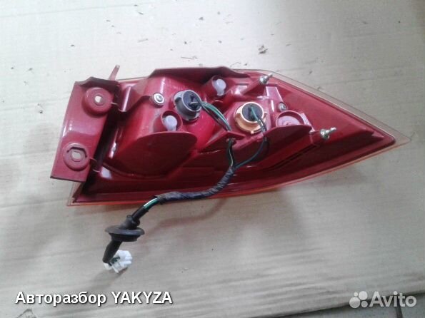 Левый фонарь фара в крыло Митсубиси Лансер 10