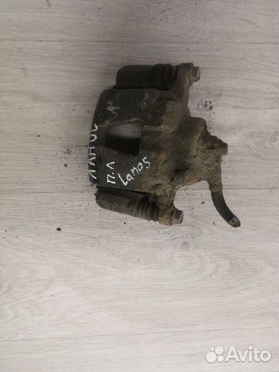 Суппорт передний левый Chevrolet Lanos