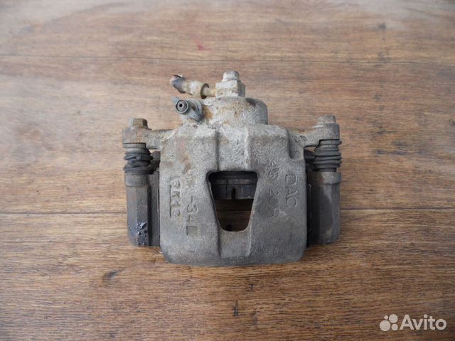 Суппорт тормозной передний правый Chevrolet Lanos