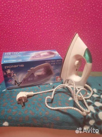 Гладильная доска и утюг