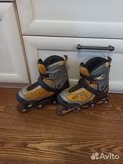 Роликовые коньки