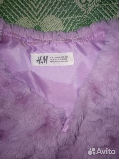 Меховая жилетка