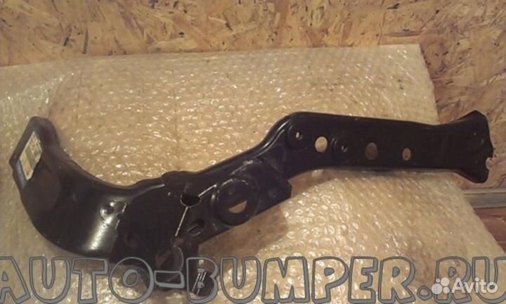 Mazda CX7 2010- Кронштейн фары правый