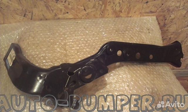 Mazda CX7 2010- Кронштейн фары правый