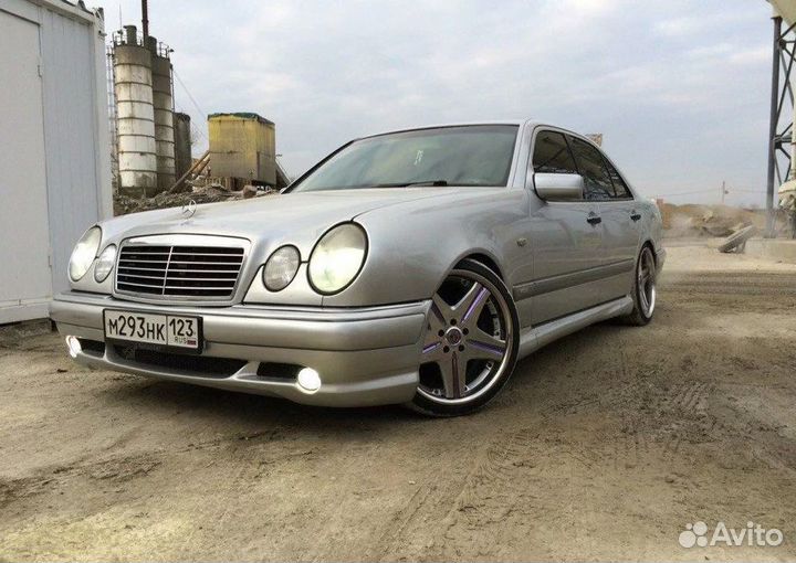 Бампер передний AMG для Mercedes W210 дорестайлинг