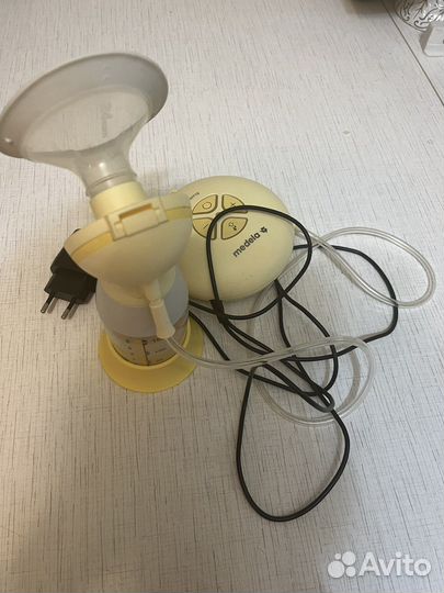 Молокоотсос medela swing flex