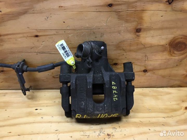 Суппорт лев. зад. mazda axela