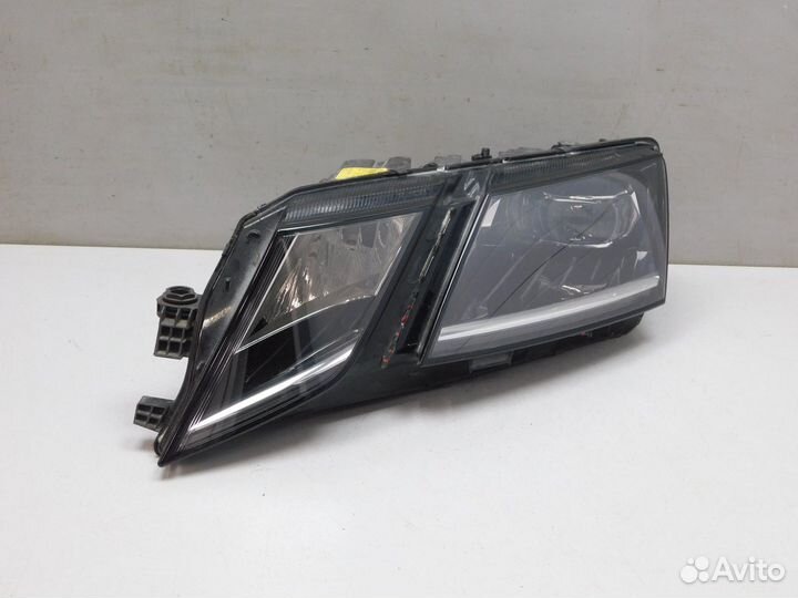 Фара левая Skoda Octavia