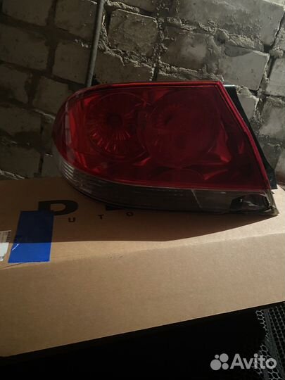 Задняя левая фара от Mitsubishi Lancer 9