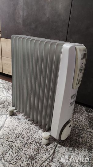 Масляный обогреватель delonghi