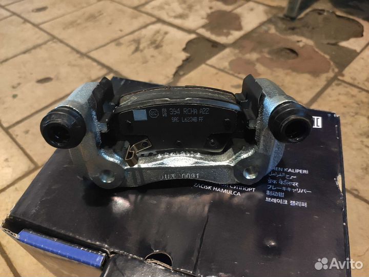 Скоба заднего суппорта solaris kia rio