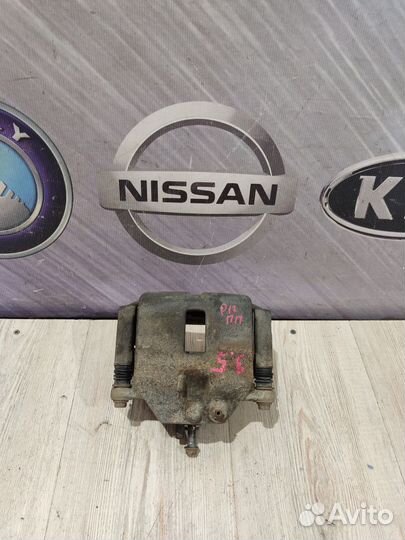 Суппорт тормозной перед Nissan primera P12 Прав