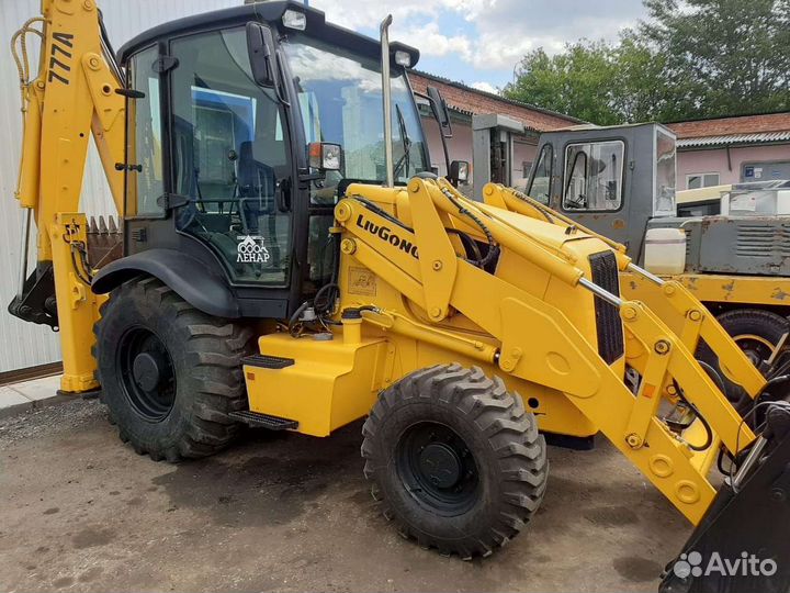 Услуги экскаватора погрузчика. И манипулятора