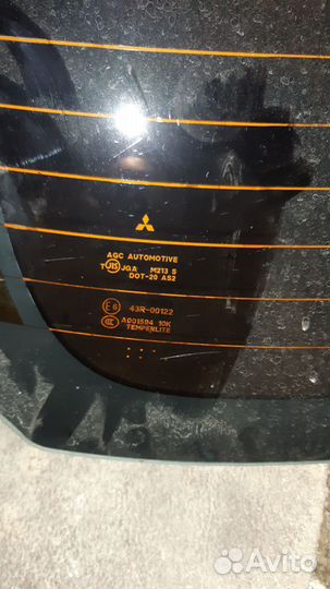 Стекло заднее lancer 10