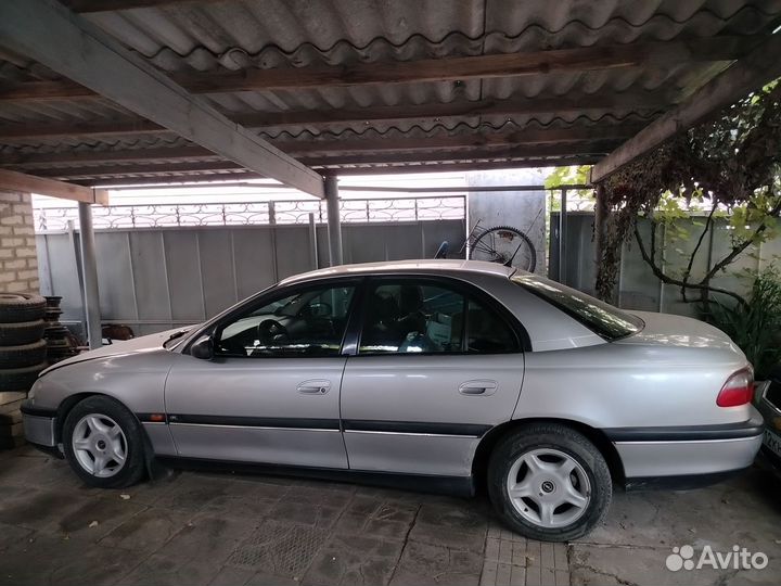 Opel Omega 2.0 МТ, 1998, 205 000 км