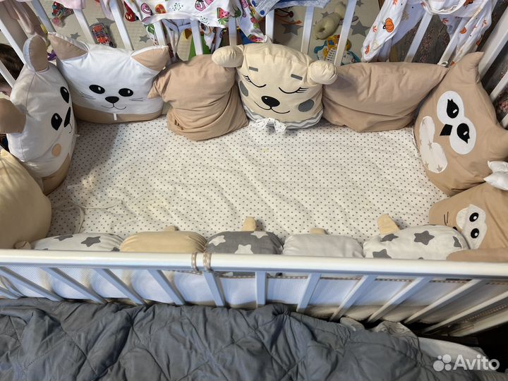 Бортики подушки в кроватку