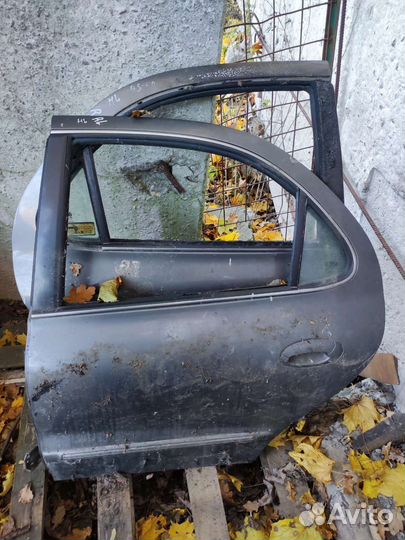 Задняя левая дверь Hyundai elantra 1995-2000