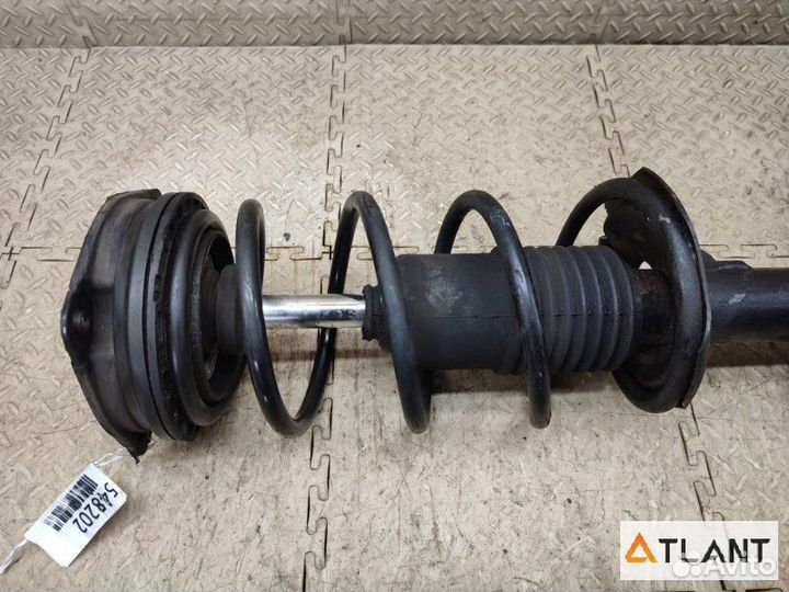 Стойка передняя левая nissan march