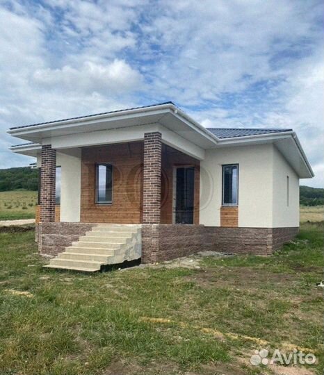 Отделка фасада дома гибкий кирпич