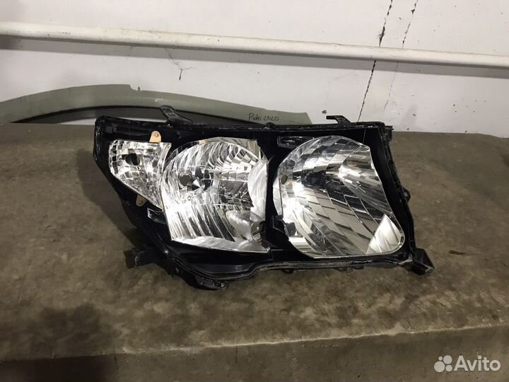 Корпус фары Toyota LC200