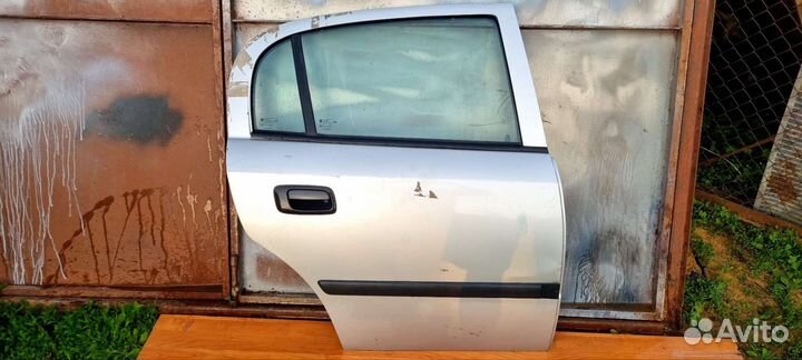 Дверь opel astra g