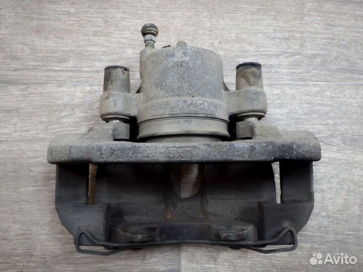 Суппорт тормозной передний левый Focus Фокус 2