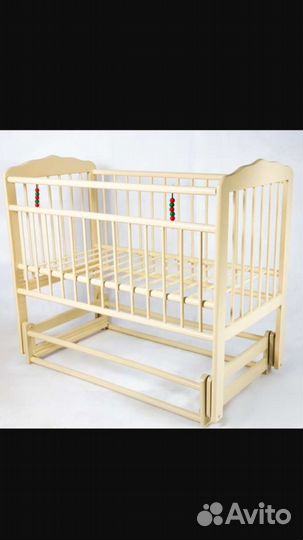 Детская кроватка с маятником