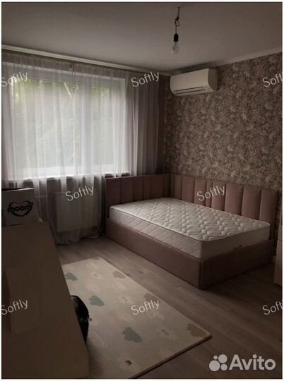 Детская кровать с мягкой спинкой