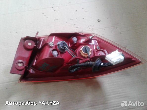 Левый фонарь фара в крыло Митсубиси Лансер 10