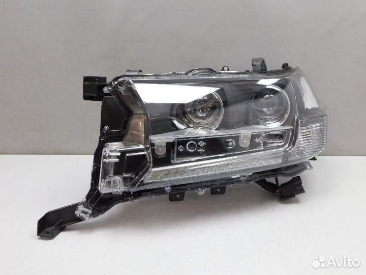 Фара левая Toyota Land Cruiser