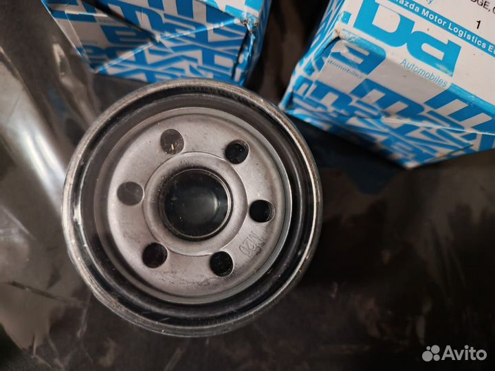 Масляный фильтр на MazdaB6Y1 14 302 9A