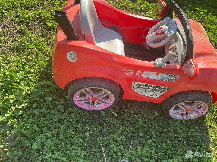 Машинка-каталка электрическая