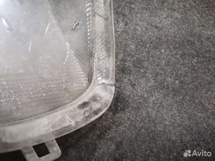 Стекло фары правое Opel Astra g