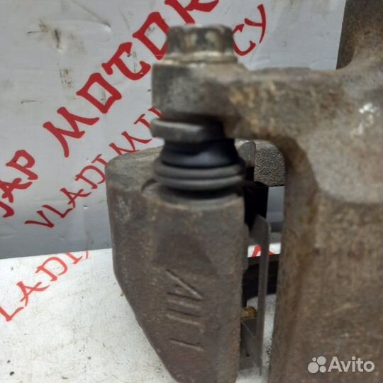 Суппорт тормозной передний Mitsubishi Outlander