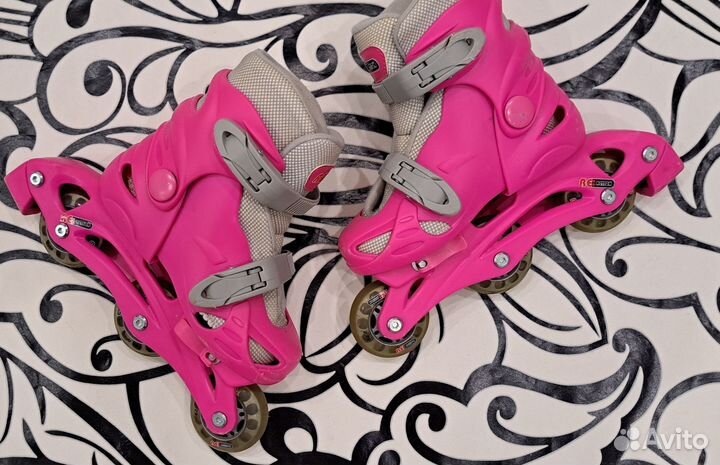 Роликовые коньки