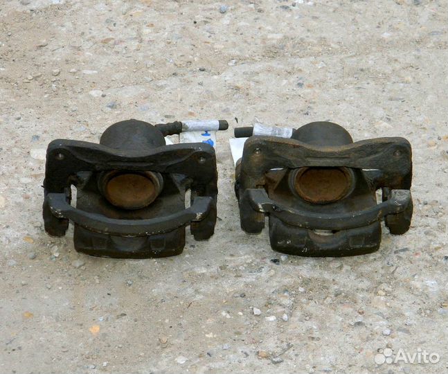 Суппорт передний Nissan Almera N15