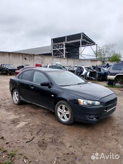 Усилитель бампера задний Mitsubishi Lancer CY 2008