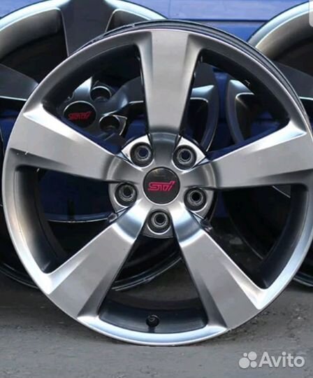 Шильдик / заглушка Subaru STI на диск