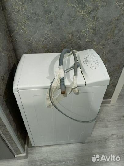 Стиральная машина с вертикальной загрузкой