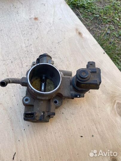 Дроссельная заслонка Kia spectra