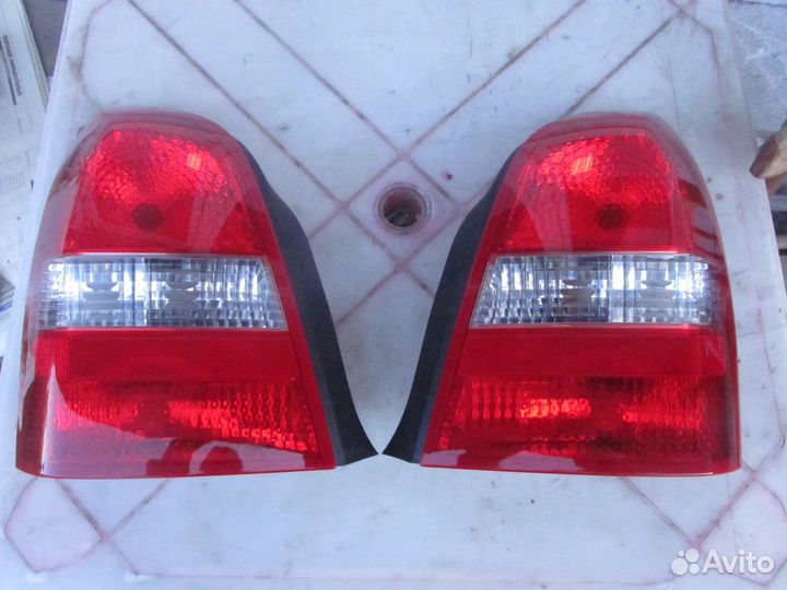 Фонарь задний 26550AU30A Ниссан Примьера Р12