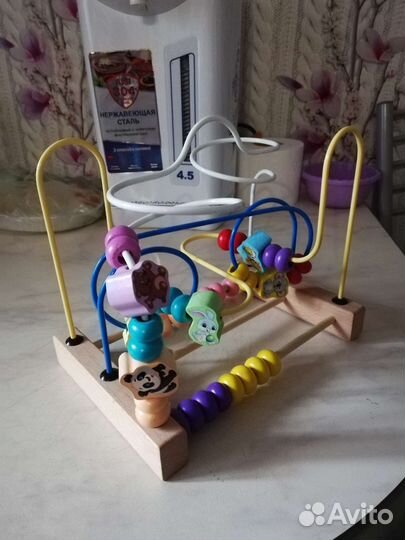 Детские музыкальные игрушки и бизиборд