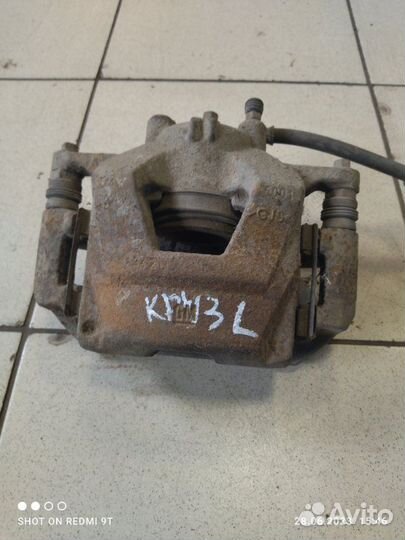 Суппорт тормозной передний левый Chevrolet Cruze