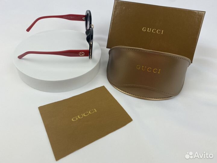 Солнцезащитные очки Gucci