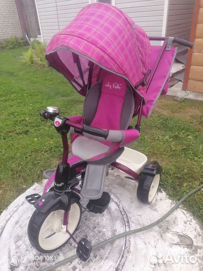 Детский велосипед с ручкой